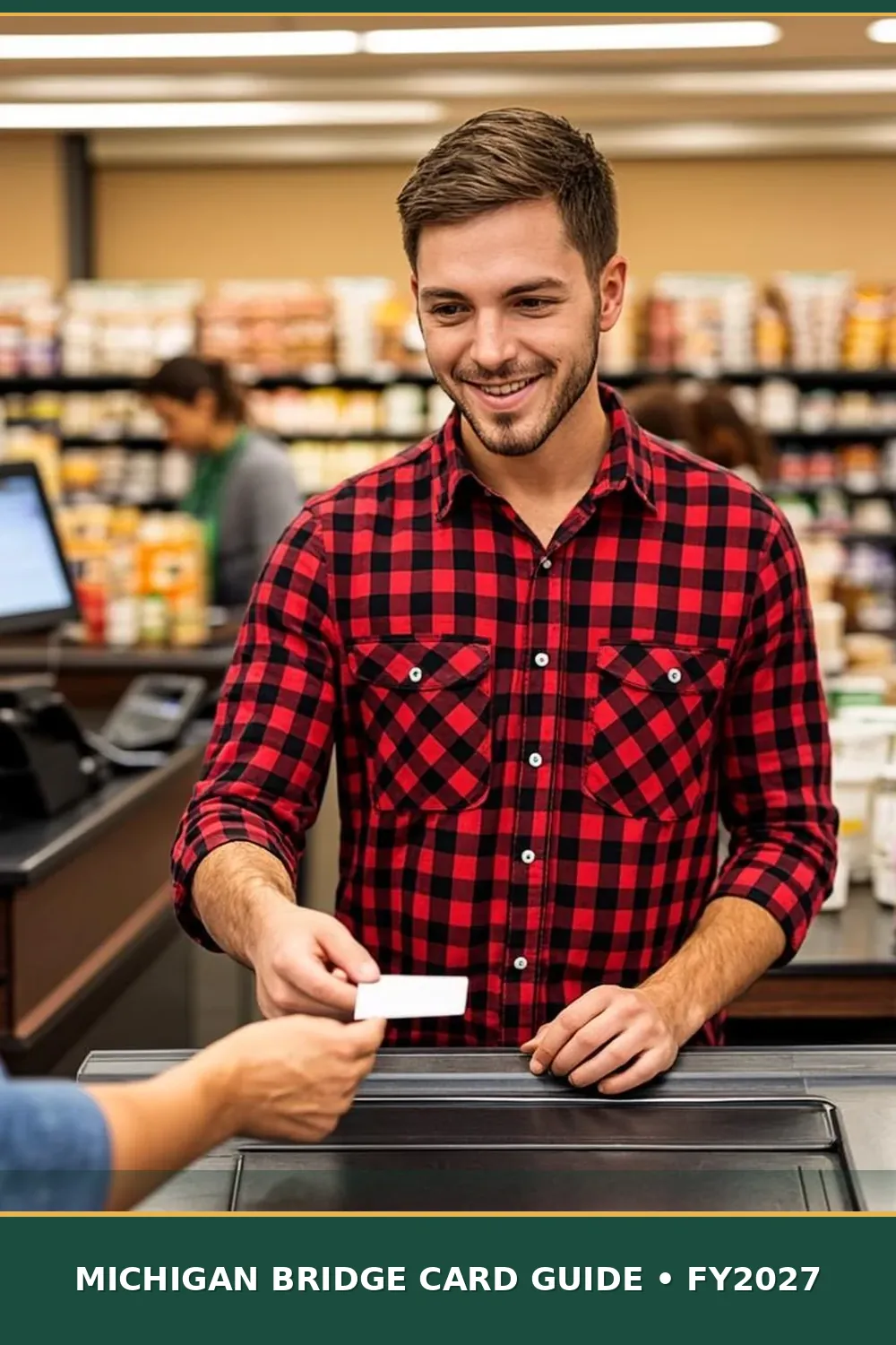 Young man in a flannel jacket paying with a state Bridge Card at a Detroit-area grocery checkout